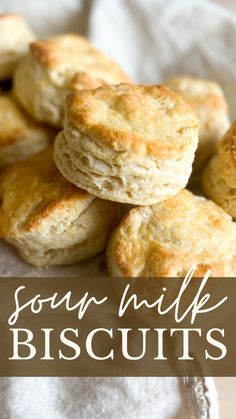 biscuits stacked on top of each other with the words sour milk biscuits in front of them