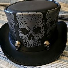 Leather Hat With Skulls. Made In Usa Size Large. Skull Headband Is Removable, And Hat Has A Lifetime Warranty With The Maker. Only Worn A Few Times, Like Brand New. Got In Sturgis Sd Handmade Black High Crown Top Hat, Black Leather Steampunk Top Hat, Custom Black Top Hat With High Crown, Custom Black High Crown Top Hat, Custom Black Hat For Party, Black Leather Top Hat With Flat Crown, Elegant Black Leather Hat Band, Gothic Hats, Skull Headband