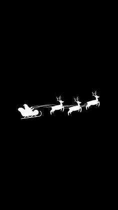 santa's sleigh flying through the night sky with reindeers on it