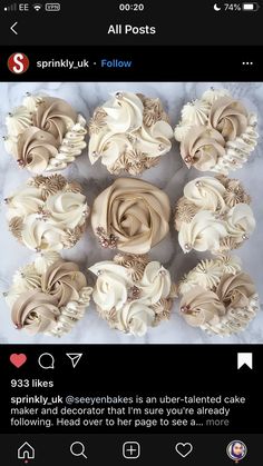 some cupcakes with frosting on them are arranged in the shape of a flower