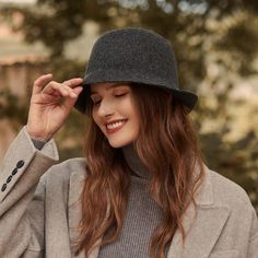 The Emes Shop hat is detailed with a luxe wool material. Features a minimalist and cloche hat design.MATERIAL:100% Brushed Wool BlendCIRCUMFERENCE MEASUREMENTS: 56-58cm 22-23in