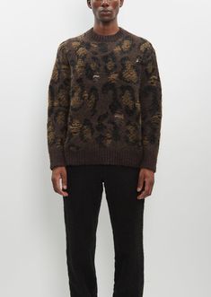 Junya Watanabe MAN leopard jacquard sweater with distressed details throughout in a wool blend. Features a ribbed neckline, cuffs, and hem. 
Sizing: Universal (S, M).
Amani is 6'1" (185cm), chest 37”, waist 29” and wears a size small.
Color: Brown. 45% Wool, 31% Polyester, 14% Cupra, 10% Nylon. Made in Japan.
FW24JWM02 Winter Leopard Print Crew Neck Sweater, Jacquard Sweater, Junya Watanabe, Ribbed Neckline, Made In Japan, Wool Blend, Japan, Wool, How To Wear