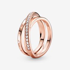 Triple your style with the Crossover Pavé Triple Band Ring. This classic yet modern 14k rose gold-plated ring boasts three interconnected bands. The top band features clear cubic zirconia pavé and overlaps over the other two bands, one of which is embossed with the Pandora logo, while the other is polished. Elegant and glamorous, once you put this stunning crossover ring on, you won't want to take it off. - Pandora Crossover Pavé Triple Band Ring - 14k Rose gold-plated unique metal blend / Cubic Pandora Logo, Triple Band Ring, Pandora Rose, Crossover Ring, Pandora Rings, Pave Ring, Matching Rings, Thomas Sabo, Gold Plated Rings