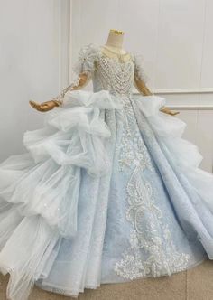 This is a gown made for The Fairest Princesses In All The Land! You You are going to fall in love with way she looks in our custom couture. All our gowns are made to order and to your measurements and specifications. Finest Materials, Exquisite Tailoring and Hand Beading, Unbeatable Prices. If your princess doesn't follow the size chart, please provide us with her chest, waist, total height, and shoulder to floor measurement. Production time: 10-12 weeks Domestic Shipping: UPS 3-5 business days Princess Wedding Ball Gown With Sweep Train, Pageant Ball Gown With Sweep Train, Princess Style Quinceanera Dress For Wedding, Princess Organza Ball Gown For Banquet, Princess Style Organza Ball Gown For Banquet, Princess Style Floor-length Wedding Dress For Debutante Ball, Pageant Ball Gown Wedding Dress In Organza, Organza Ball Gown Wedding Dress For Pageant, Blue Fairytale Dress For Wedding