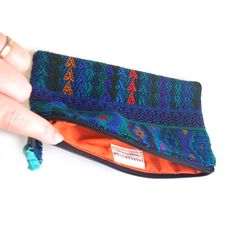 Looking for the perfect ZERO WASTE accessory? Then this little Pouch (and it's slightly smaller, sister Lunita) is what you've been looking for. This darling clutch sized Travel pouch is perfect for keeping your things in order when you travel near and far. Its bold textile print comes from re-purposed traditional hand-woven huipiles, the indigenous clothes of local Maya women. Instead of throwing out these leftover scraps from past projects, we preserve their integrity and give them a second li Indigenous Clothes, Zero Waste Travel, Textile Print, Travel Pouch, Textile Prints, Weekender Bag, Zero Waste, You've Been, Hand Woven