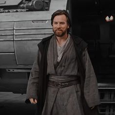 luke star wars the force awakes in front of a truck with his hand on his hip