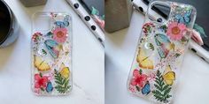 two phone cases with flowers and butterflies on them, one has a pen next to it