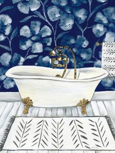 a bath tub sitting on top of a tiled floor next to a blue and white wall