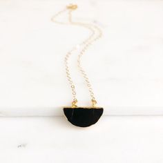 Black Crescent Moon Necklace in Gold. Black Stone Crescent NecklaceThe crescent is about .75" across and the necklace is 18" long on 14k gold filled chain. Questions?  Please don't hesitate to start a convo, we'd love to hear from you!_________________________________________________________WELCOME!Welcome to Rustic Gem Jewelry! Thank you for visiting our shop. We take custom orders and can often do a similar piece in different colors. We also offer bulk / bridal discounts. If you have any quest Black Crescent Moon, Gem Jewelry, Crescent Necklace, Crescent Moon Necklace, Gems Jewelry, Moon Necklace, Black Stone, Gold Filled Chain, Crescent Moon