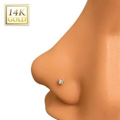 the side view of a woman's breast with diamond studs