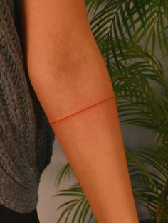 a person with a red line on their arm