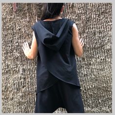 "Asymmetric Loose black vest top🤩 Extravagant designs and high quality fabrics. The item from the pictures is size S For more information feel free to ask questions. Material &Care Cotton end Elastane Machine wash 30oC Hand wash at low temperatures Do not machine dry Medium hot iron Sizing We make size from xs to 5xl as well as customized measures.So don't hesitate to contact us and make one for you. 🛫🎁Shipping🎁 🛬 STANDARD SHIPPING Europe : 6-8 business days USA&Canada : 8-10 busine Black Vest Top, Asymmetric Top, Hot Iron, Black Vest, Asymmetrical Tops, Cotton Top, Vest Top, Black Top, Top Casual