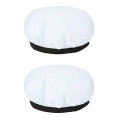 two white chef hats with black trims