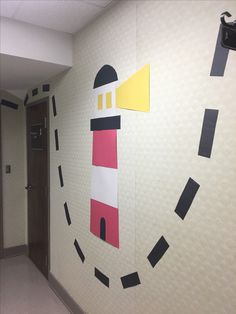 the hallway is decorated with black, white and pink paper