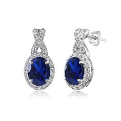 PRICES MAY VARY. FEATURE - These charming earrings for women showcase oval created blue sapphire gemstones delightfully set below white topaz studded X designs. These drop earrings enhance your daytime and evening attire. Add an additional piece to your fine sapphire jewelry and gemstone jewelry collection. CRAFTED - These jewelry earring drops are crafted of 925 sterling silver, nickel free and tarnish free. They secure with post and friction backs. CARE - Keep from water cosmetics & chemical p Fine Jewelry Display, White Topaz Earrings, Beautiful Tiaras, Earrings For Girls, Blue Topaz Earrings, Sapphire Earrings, Sapphire Jewelry, Topaz Gemstone, Fine Jewellery Earrings