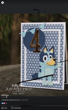 a card with the number four on it and a cartoon character in front of it