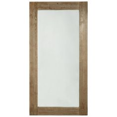 a wooden framed mirror on a white wall