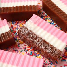 chocolate bars with sprinkles and frosting on them