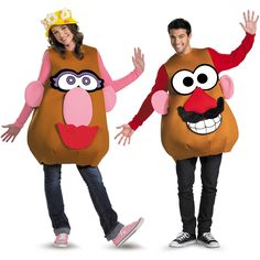 two people in costumes standing next to each other with their hands out and one person wearing a costume that looks like a potato head