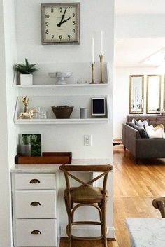 the kitchen is clean and ready to be used as a dining room or living room