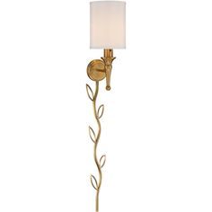 a gold wall light with a white shade on the side and a leaf design in the middle