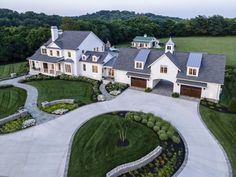 an aerial view of a large home in the country