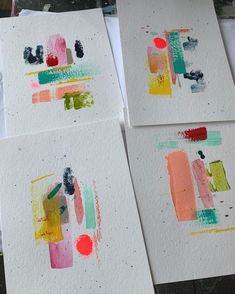 four pieces of paper that have been painted with different colors