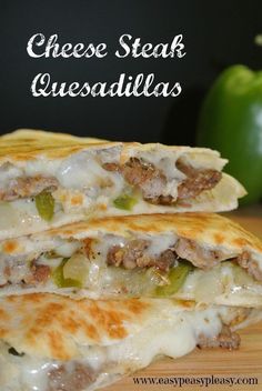 two quesadillas stacked on top of each other with cheese and meat in them