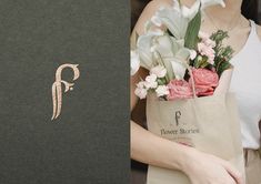 a woman holding a brown paper bag with flowers in it and the letter f on it