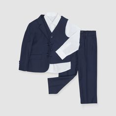 It would be hard to find anything more classic than our kids' navy suit! This suit is perfect for a ring bearer on the wedding day and can be worn again for school events or special holidays. This boy's navy blue four-piece suit set is available in toddler and youth suit sizes 2T to 10. Royal Blue Suit Wedding, Navy Groomsmen, Blue Groomsmen, Navy Suit Wedding, Tuxedo Women, Blue Suit Wedding, Planning Board, Birdy Grey, Ring Bearers