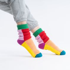 These unisex fleece-lined knit slipper socks are the best of both worlds! The easy fit of socks meets the plush comfort of house slippers. Our Kaleidoscope House Socks are knit with punchy fun colorblocking to keep you cozy (and bright) indoors. These soft knitted socks are fully lined with fluffy faux fleece for extra warmth. Slip-resistant patches on sole. Machine washable. Sizes S/M (Womens 6-9, Mens 5-7.5)L/XL (Womens 9.5-12.5, Mens 8-11) Details Body – 100% Soft AcrylicLining - Polyester Fl Knit Slipper Socks, House Socks, Spanish Shirts, Foot Socks, Soft Slippers, Knitted Socks, Quick Gifts, Knitted Slippers, Slipper Socks