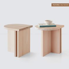 two wooden tables sitting next to each other