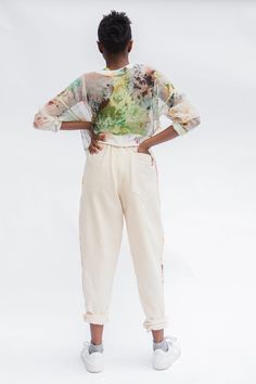 The Pocket Pant in Natural offers an inclusive fit with a relaxed silhouette and elasticized waist for optimal comfort. Crafted from 100% hand woven cotton, these pants feature lined patch pockets, a hand dyed pseudo tuxedo stripe and a cuff for an extra touch of style. Key Features include: 100% Handwoven organic cotton Self-lined cuffs and pockets Soft, elastic waist Hand dyed cotton scrap strip in side seam Ameera is wearing the XS Pocket Pant with S/M Silk Sweatshirt in Spring Size Waist, Un Summer Tapered Leg Pants With Elastic Cuffs, Spring Hand Dyed Straight-leg Bottoms, Spring Hand Dyed Straight Leg Bottoms, Spring Straight Leg Hand Dyed Bottoms, Hand Dyed Relaxed Fit Straight Leg Pants, Hand Dyed Straight Leg Bottoms With Relaxed Fit, Spring Hand-dyed Relaxed Fit Pants, Spring Hand Dyed Relaxed Fit Pants, Spring Relaxed Fit Hand Dyed Pants