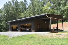 a garage with two cars parked in it