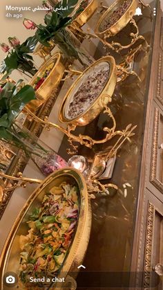 an ornately decorated buffet table with food on it