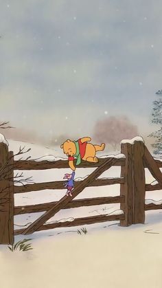 winnie the pooh jumping over a wooden fence in the snow with her feet up