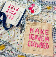 a bag with the words make heaven crowded written on it next to another bag that says,