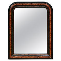 A French Louis-Philippe style wooden mirror from the early 20th century, with tortoise style painted frame, brown and black accents. Created in France during the Turn of the Century which saw the transition between the 19th to the 20th, this wooden mirror captures our attention with its highly recognizable Louis-Philippe silhouette with clean lines and rounded corners in the upper section, and tortoise style painted frame contrasted with black accents. The back presents a single plank and is wir Demilune Table, Mirror Plates, Louis Philippe, Wooden Mirror, Turn Of The Century, Black Accents, Round Corner, Early 20th Century, Rounded Corners