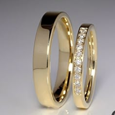 two gold wedding rings with diamonds on each one and the other in yellow gold or white gold