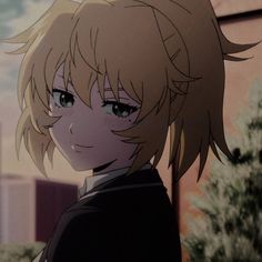 an anime character with blonde hair and blue eyes looks at the camera while standing in front of a building