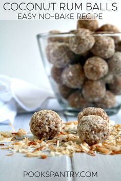 coconut rum balls in a glass bowl on a wooden table with text overlay that reads coconut rum balls easy no bake recipe