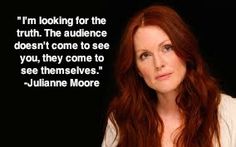 a woman with long red hair is looking at the camera and has a quote on it