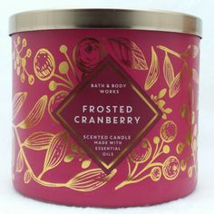 bath and body works frosted cranberry scented candle in pink tin with gold trim