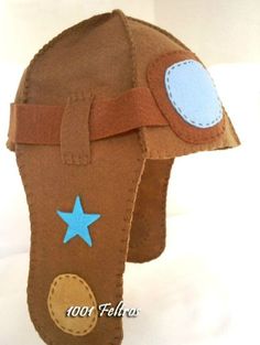 a brown hat with a blue star on it