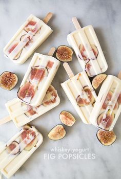 several popsicles with figs and cheese on them