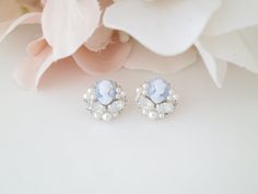 These petite button earrings feature a pale blue cameo with added accents of White Opal and pearl.  A perfect way to add your something blue for the minimalist bride or her bridal party. Measures 0.5 inches in diameter. Items arrive in a beautiful hand decorated gift box. Ready to ship in 3-5 business days. Elegant Cameo Earrings For Wedding, Blue Cameo Jewelry For Wedding, Dainty Wedding Earrings, Something Blue For Bride, Blue Earrings Wedding, Blue Bridal Earrings, Dainty Wedding, Formal Earrings, Minimalist Bride