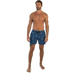 Ride the waves in style with our Caribbean Cove men's shorts. Inspired by the surf culture of the Caribbean, these shorts feature a trendy navy blue color scheme and a surf-inspired design. Perfect for the beach or the boardwalk, our shorts are made with high-quality materials that provide maximum comfort, durability, and flexibility. The elasticated waist and drawstring adjustment ensure a secure and comfortable fit, making them ideal for any activity. Whether you're surfing, swimming, or loung