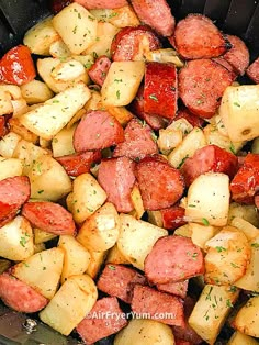 cooked sausage and potatoes in a slow cooker