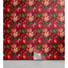 a wallpaper with red flowers on it