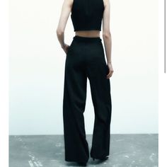 Nwt Size Small Black Wide Leg Pants From Zara. Style Number 2294/408. Has Pockets. Adjustable Straps At Each Side Of The Waist. Black High-waisted Pantsuit With Pockets, Chic Black Pantsuit With Pockets, Black Spring Pantsuit With Pockets, Spring Black Pantsuit With Pockets, Black Fitted Pantsuit With Wide-leg Pants, Black Fitted Wide-leg Pantsuit, Zara Black Pants With Belt Loops, Zara High Waist Pantsuit For Workwear, Spring Black High-waisted Pantsuit